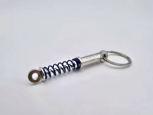 Lengéscsillapító gátló - kulcstartó kulcs tartó