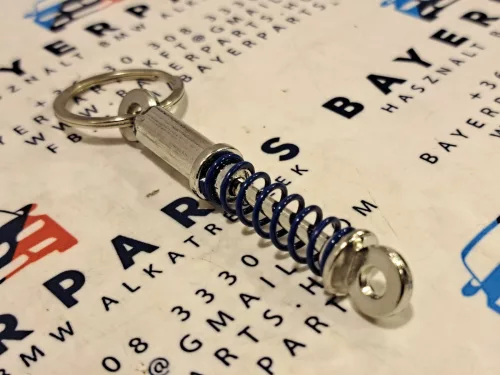 Lengéscsillapító gátló - kulcstartó kulcs tartó