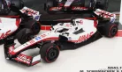 HAAS  F1  SET 2X VF-22 FERRARI TEAM HAAS N 20 5th BAHRAIN GP 2022 KEVIN MAGNUSSEN + N 47 BAHRAIN GP 2022 MICK SCHUMACHER