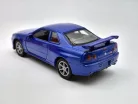 Nissan Skyline GT-R R34 coupe (1999) - Welly - 1:40