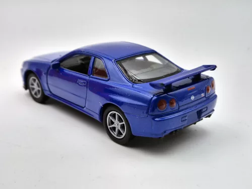 Nissan Skyline GT-R R34 coupe (1999) - Welly - 1:40