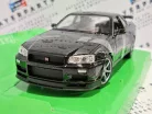 Nissan Skyline GT-R R34 Coupe (1999) -  Welly - 1:24 - kis hibával
