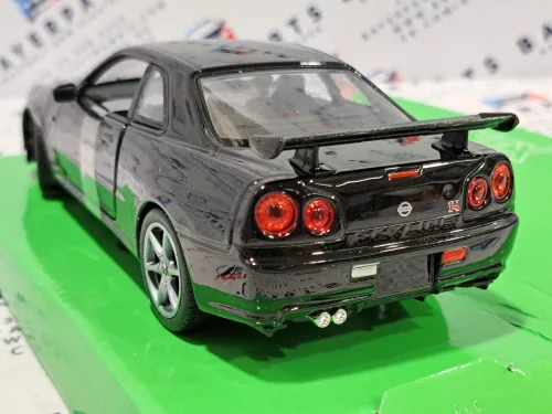 Nissan Skyline GT-R R34 Coupe (1999) -  Welly - 1:24 - kis hibával