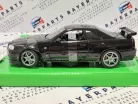 Nissan Skyline GT-R R34 Coupe (1999) -  Welly - 1:24 - kis hibával