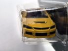 Mitsubishi Lancer Evolution EVO - sárga -  Majorette - 1:64